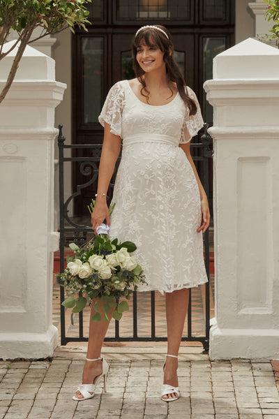 A-line maternity wedding dress made of lace with embroidery