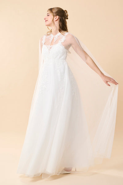 Maxi bridal cape with lace appliqués