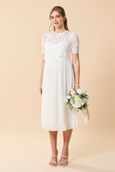 Maternity wedding dress with sweetheart neckline and lace overlay