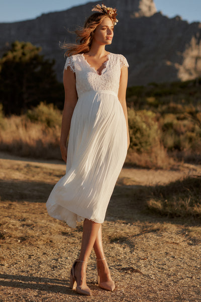 Maternity wedding dress with lace bodice and pleats